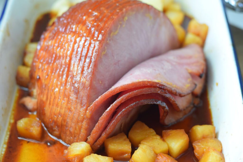 honey glazed ham in pan