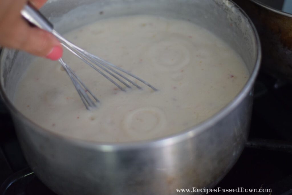 mixing a roux for spinach maria